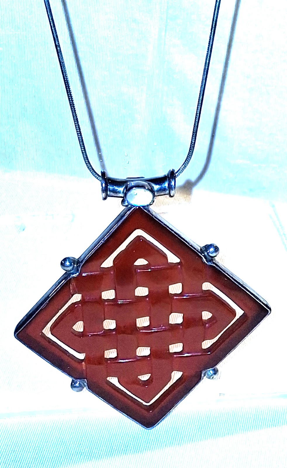 Celtic Carnelian Knot Pendant with Moonstone Ferrule
