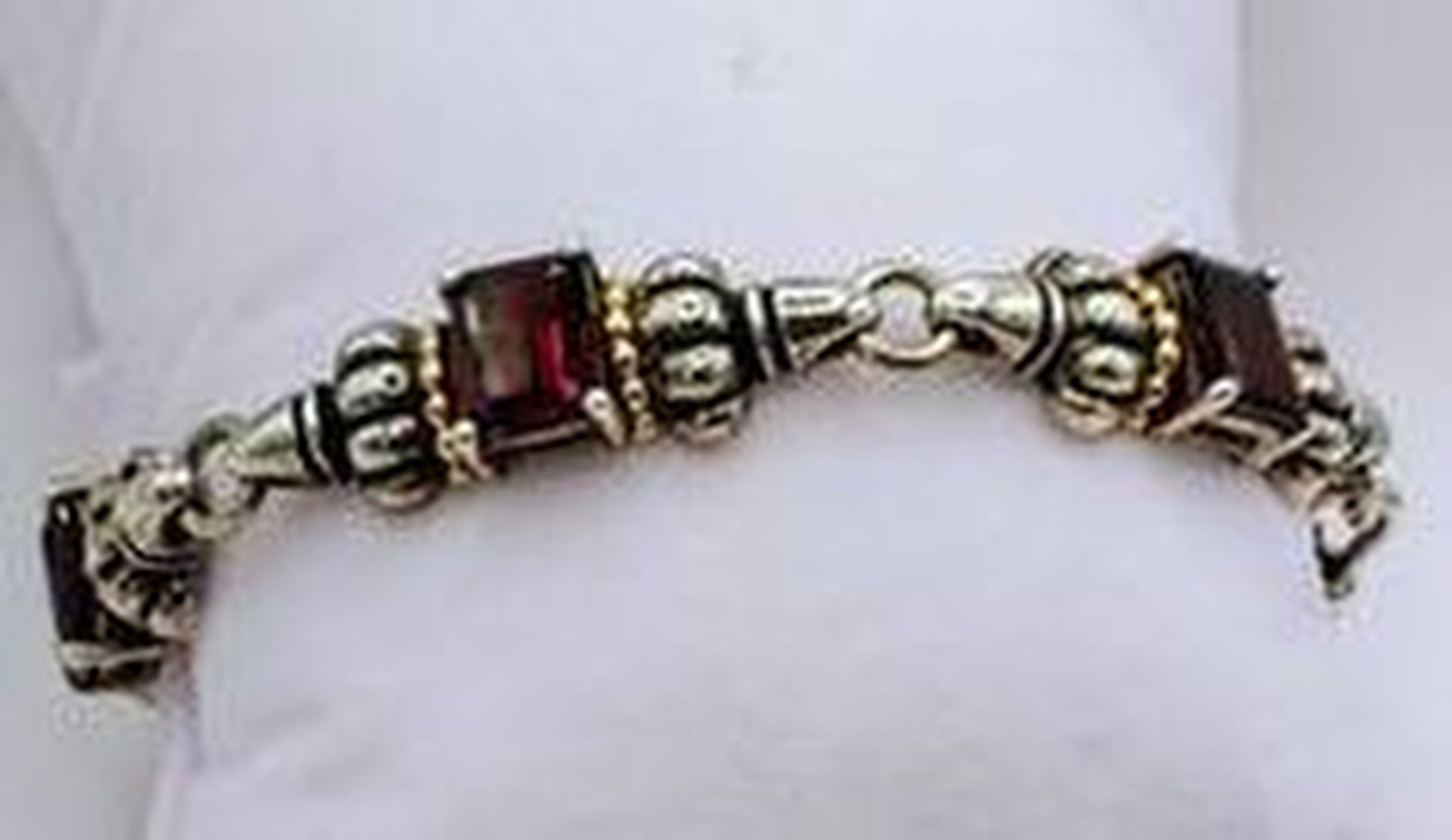 Vintage Clyde Duneier Bracelet — Silver, Gold, and Garnet Segmented Design