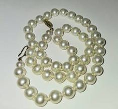White Cultured Pearl Necklace with Chinese Symbol Clasp